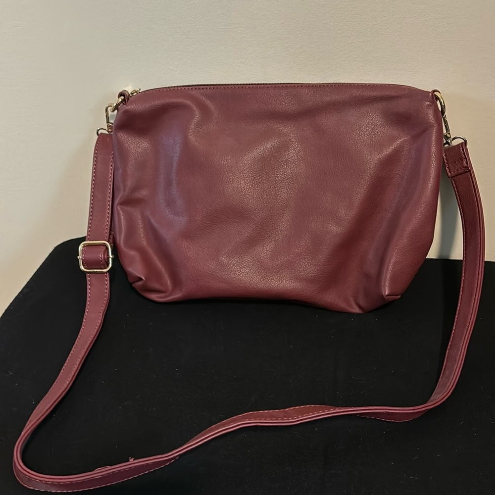Maroon faux leather cross body bag